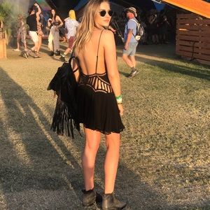 Black open back mini dress with cut out detail by magali pascal